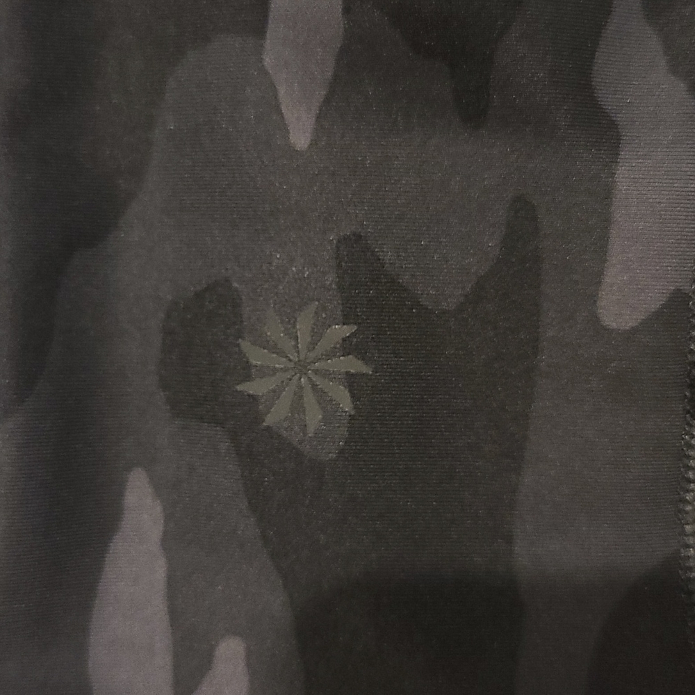 Practically brand new!  Athleta Ultimate 7/8 tights in black camo print. Size XS - Picture 2 of 9